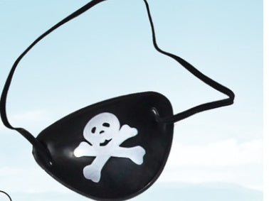 Black pirate eye patch with a skull and crossbones design on a light blue background