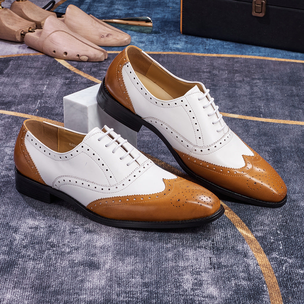 Brown and white dress shoes on a textured surface