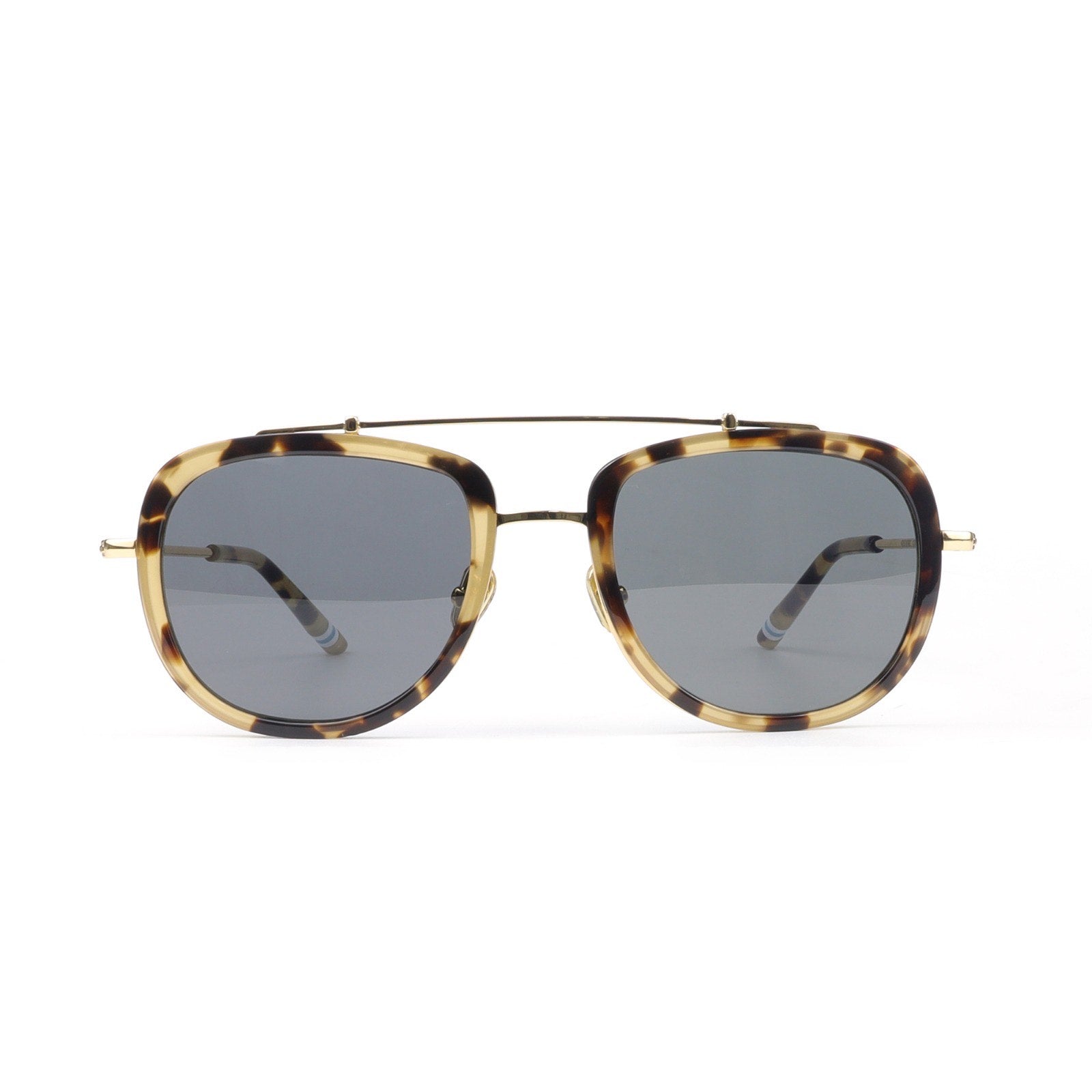 Sunglasses with tortoiseshell frame and dark lenses on a white background