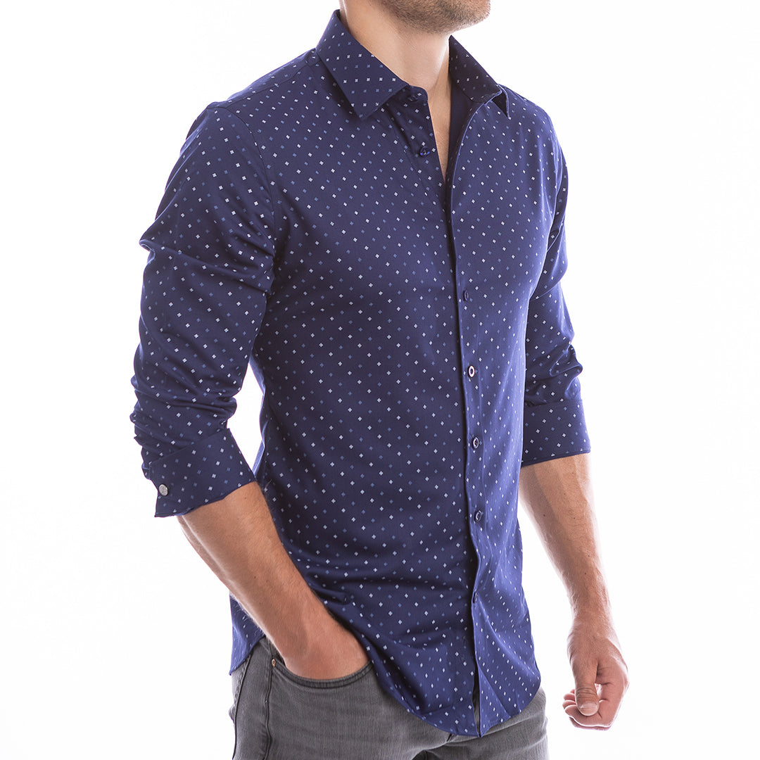 Man wearing a blue patterned shirt on a white background