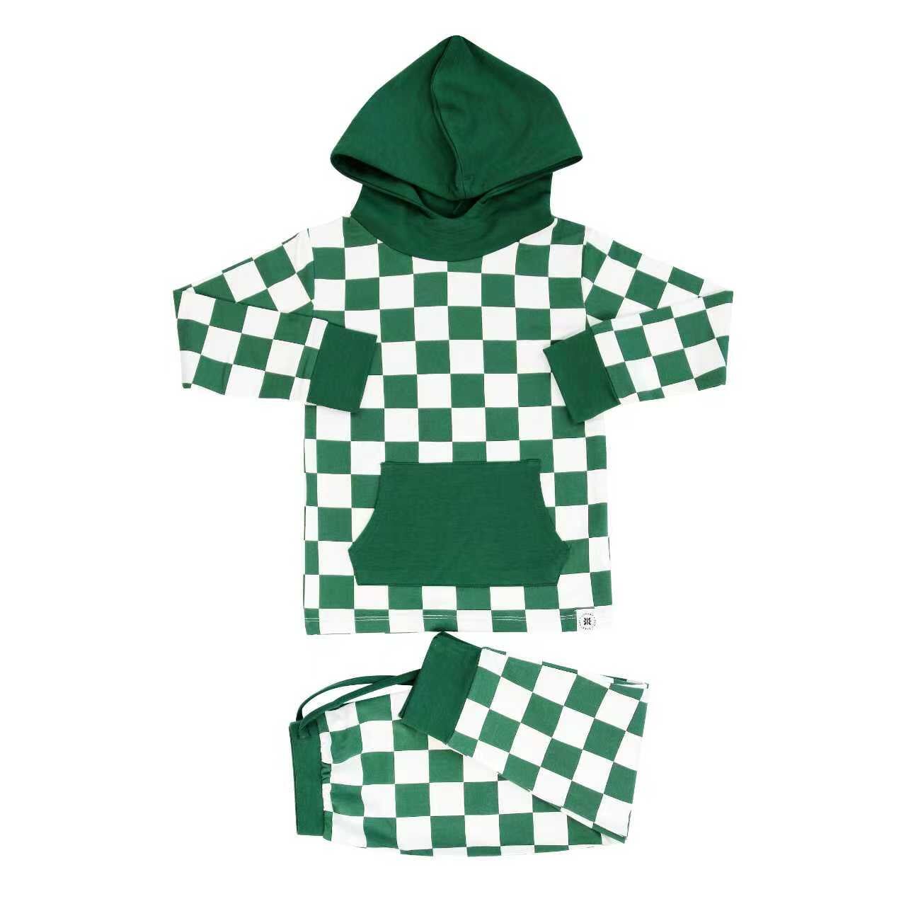 Green and white checkered hoodie and shorts set on a white background