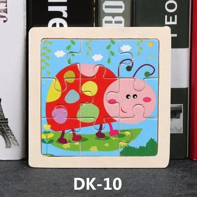 Children's puzzle with a colorful caterpillar design on a wooden frame, placed on a surface with books in the background.