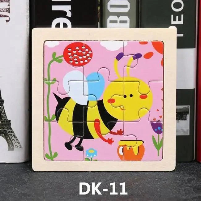 Children's puzzle with a bee design on a pink background, placed on a surface with books in the background.