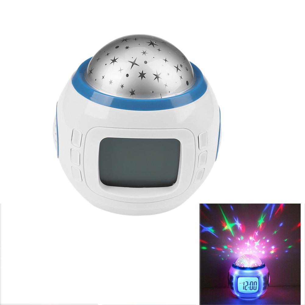 Starry night light projector with digital display on a white background