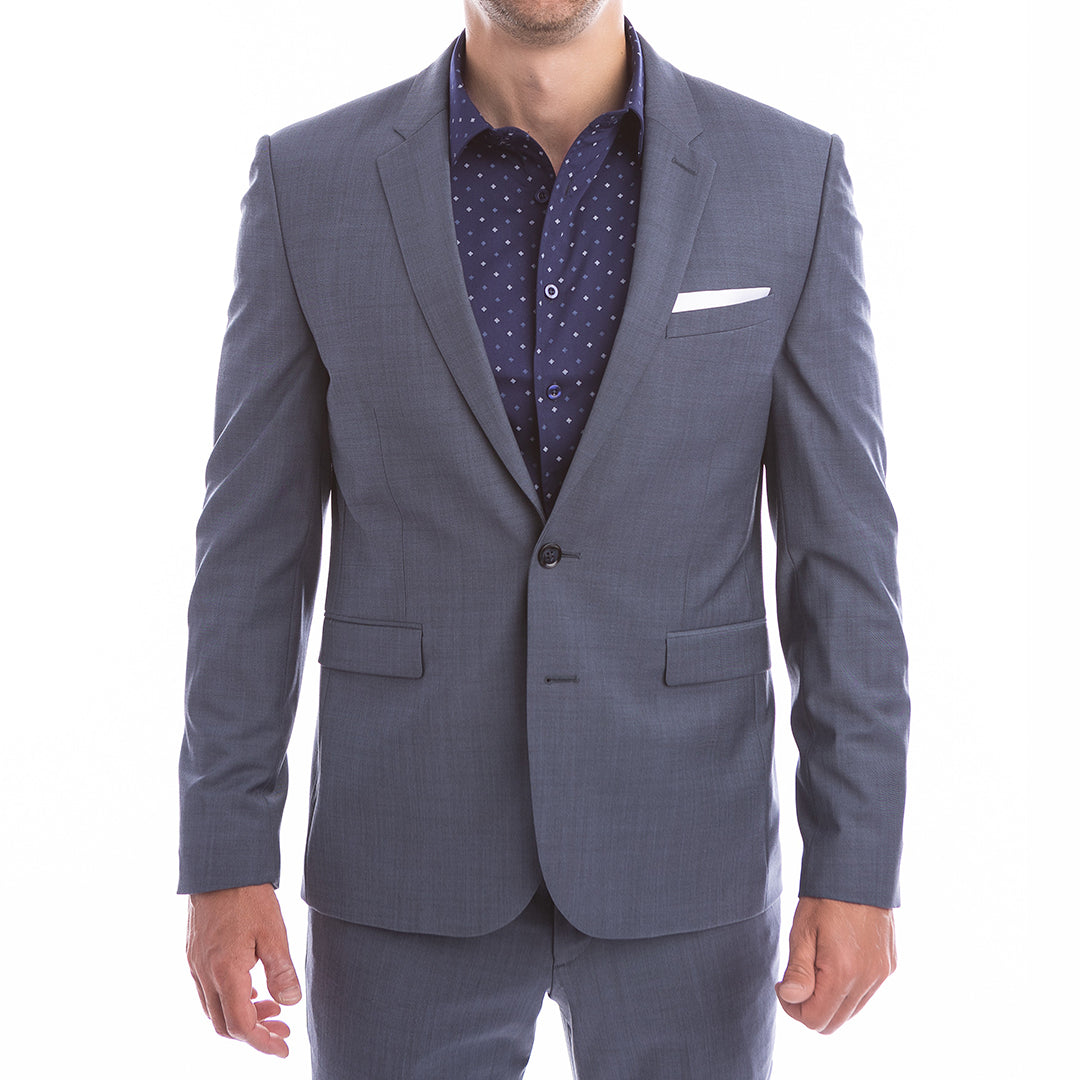 Gray suit jacket with a white shirt and patterned dress shirt underneath on a white background