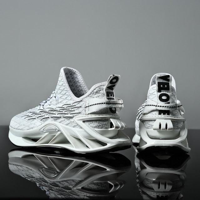 Pair of futuristic white sneakers on a reflective surface with a gray background