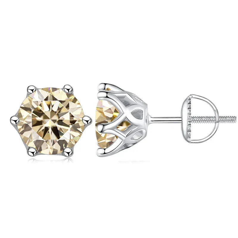 Pair of yellow gemstone stud earrings on a white background