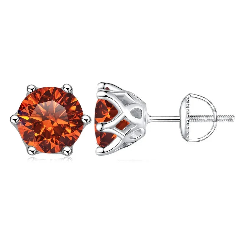 Pair of orange gemstone stud earrings on a white background