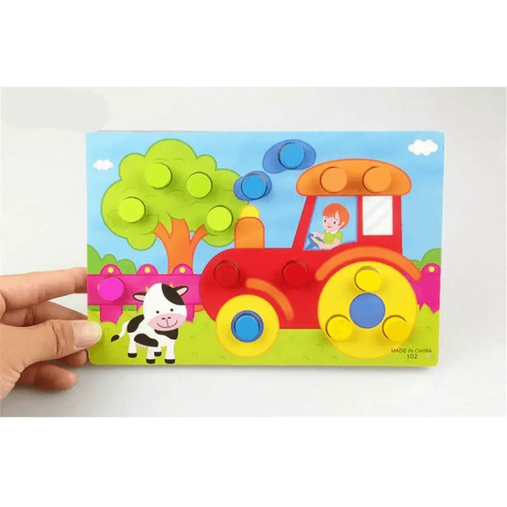 Colorful children's puzzle with a train design held by a hand on a white background