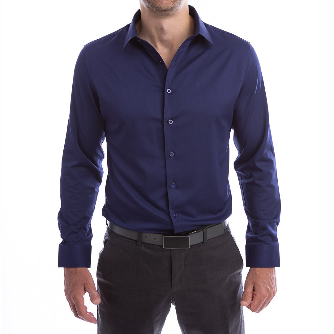 Man wearing a blue dress shirt and black pants on a white background