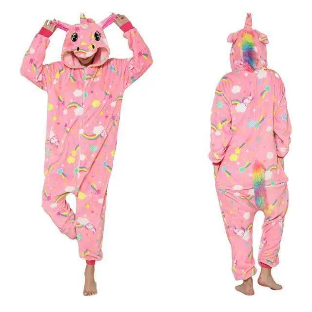 Pink unicorn onesie with colorful patterns on a white background