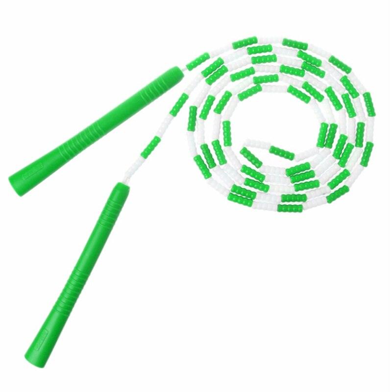 Green and white jump rope on a white background