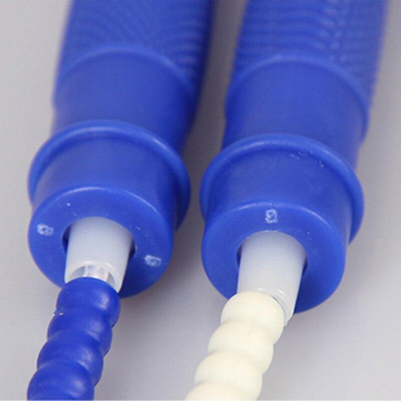 Two blue pipettes with white nozzles on a light gray background