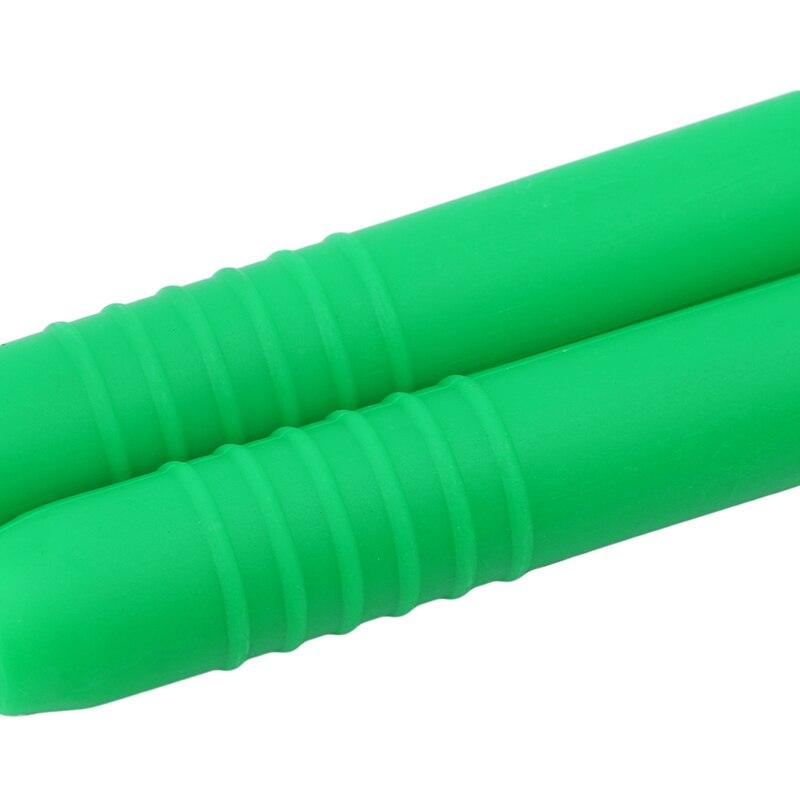 Two green foam rollers on a white background