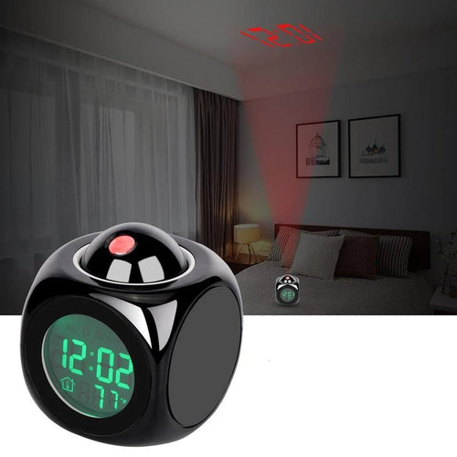 Digital clock with red light projection in a bedroom setting