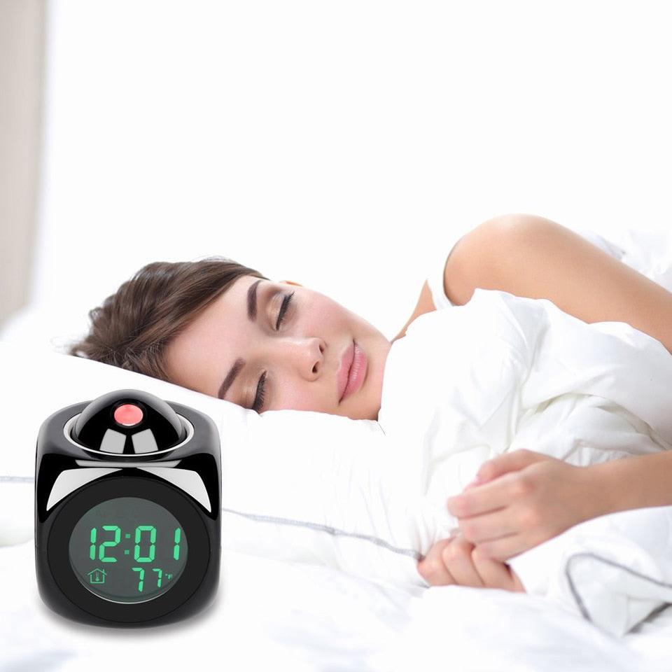 Person sleeping with a digital clock showing time and temperature on a white background
