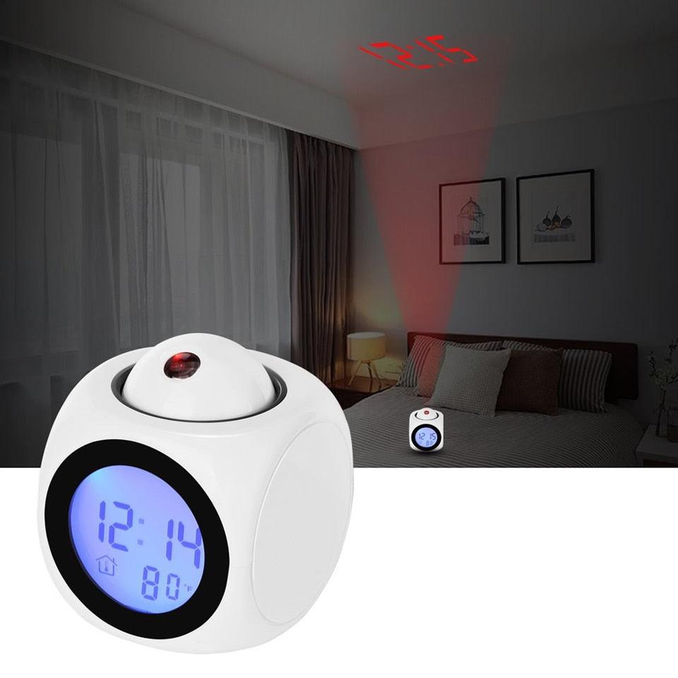 Digital clock with temperature display in a bedroom setting