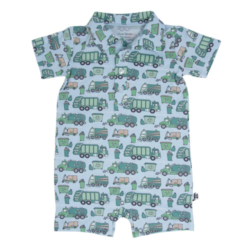 Children's romper with garbage truck pattern on a light blue background