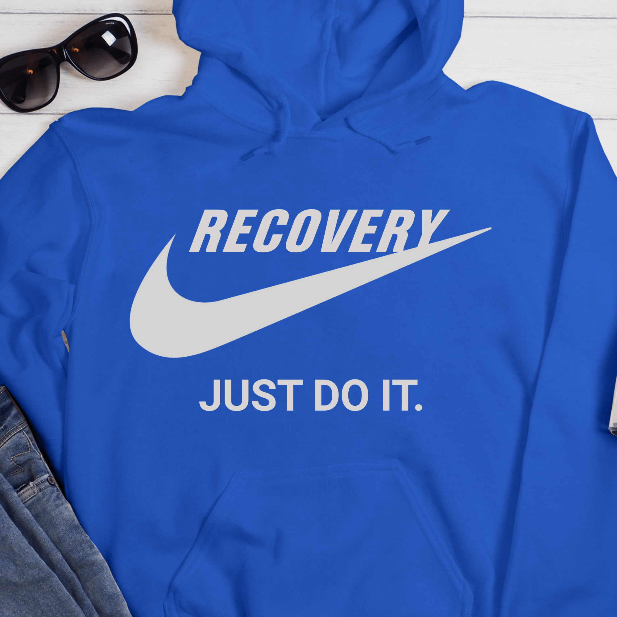 Blue hoodie with 'RECOVERY JUST DO IT.' text on a white background