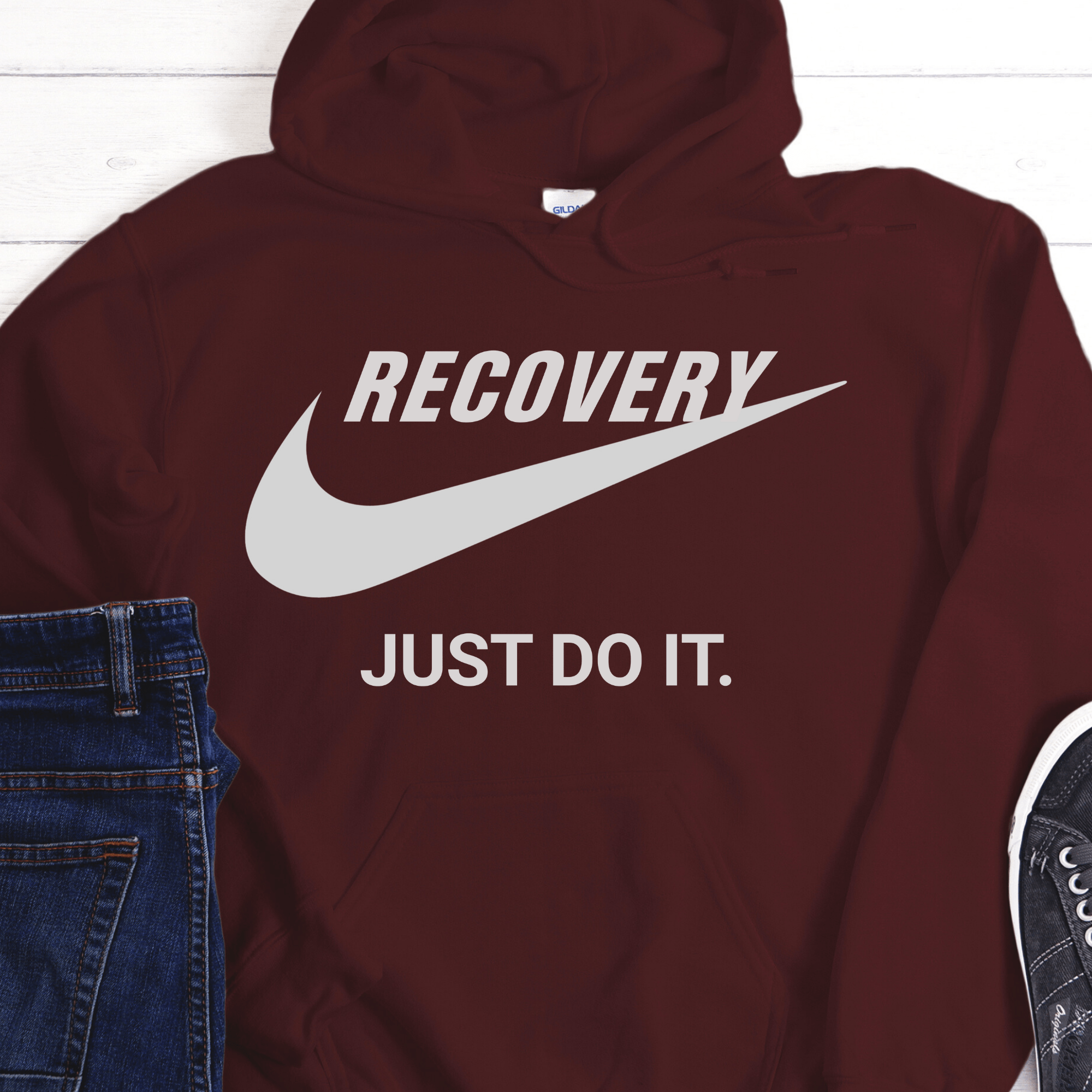 Maroon hoodie with 'RECOVERY JUST DO IT.' text on a white background
