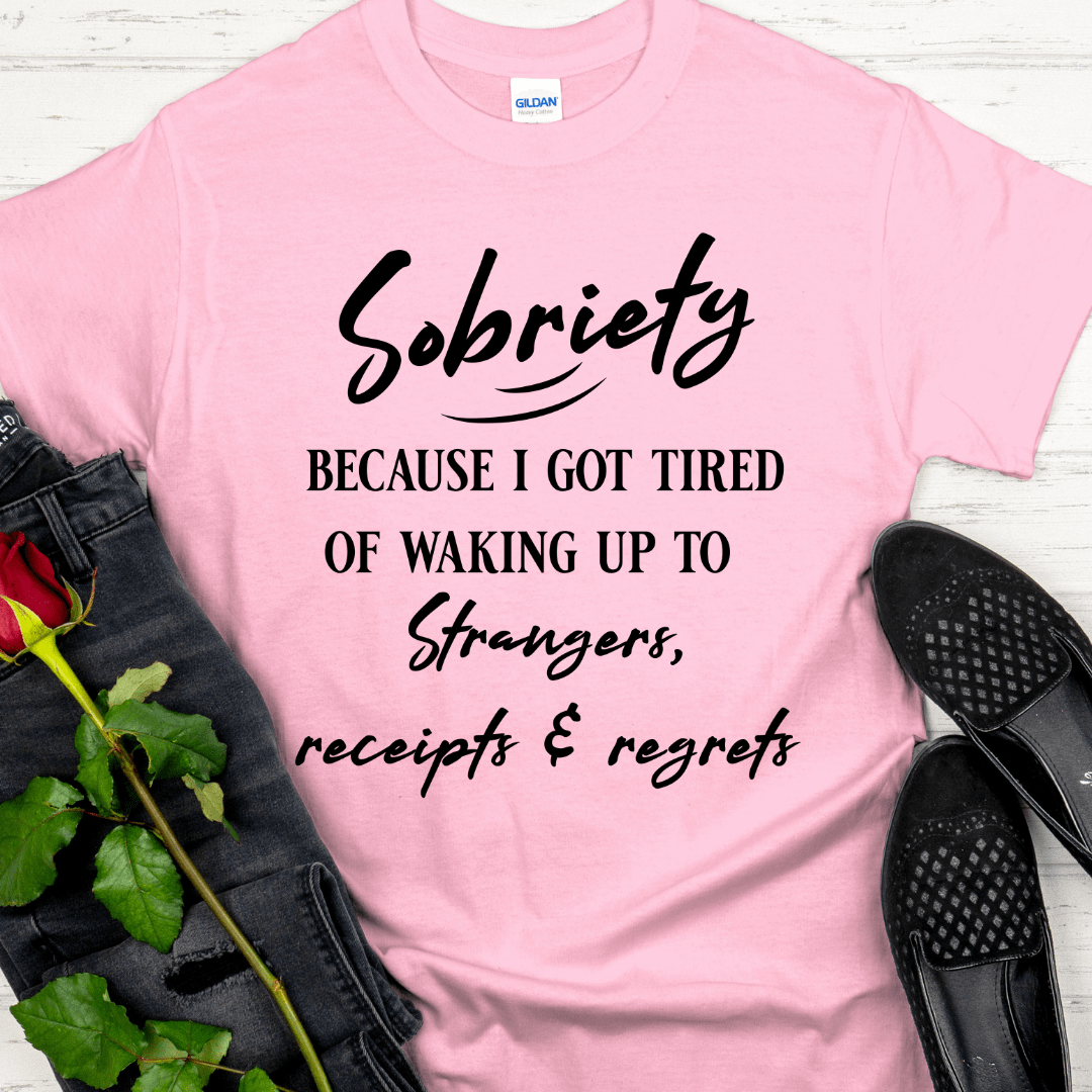 Pink t-shirt with motivational quote on a white background