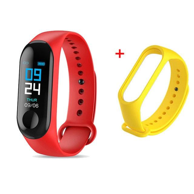 Red and yellow fitness trackers on a white background