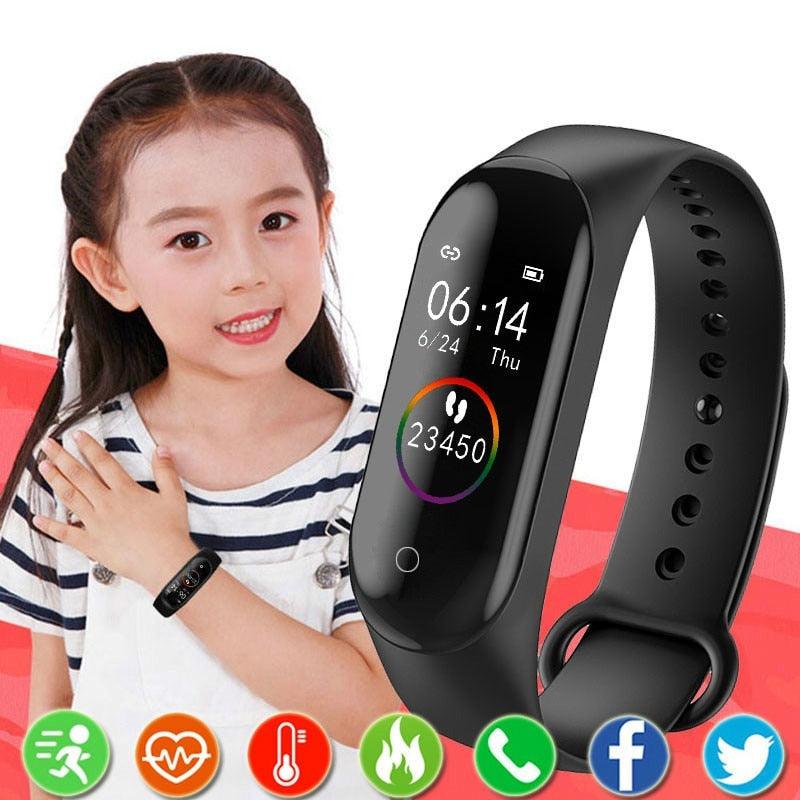 Child wearing a black smartwatch with a colorful display, on a white background.