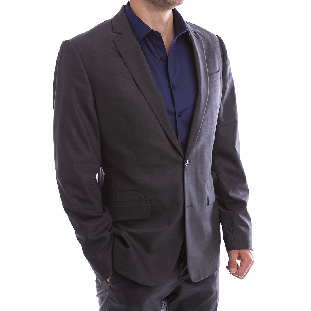 Dark gray blazer over a blue shirt on a white background