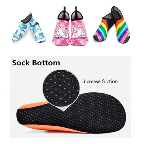 Colorful sock bottoms with different designs and a close-up of a black sock bottom with text.
