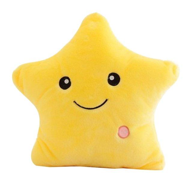 Yellow star-shaped plush toy with a smiley face on a white background