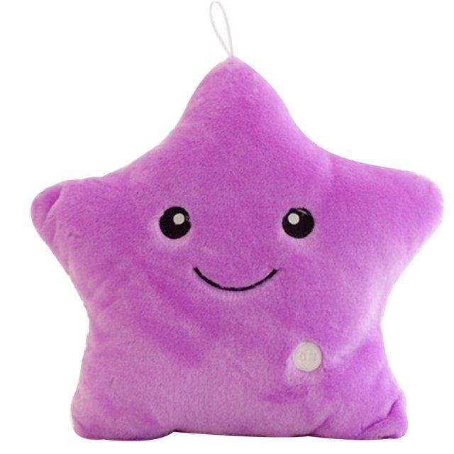 Purple star-shaped plush toy with a smiley face on a white background