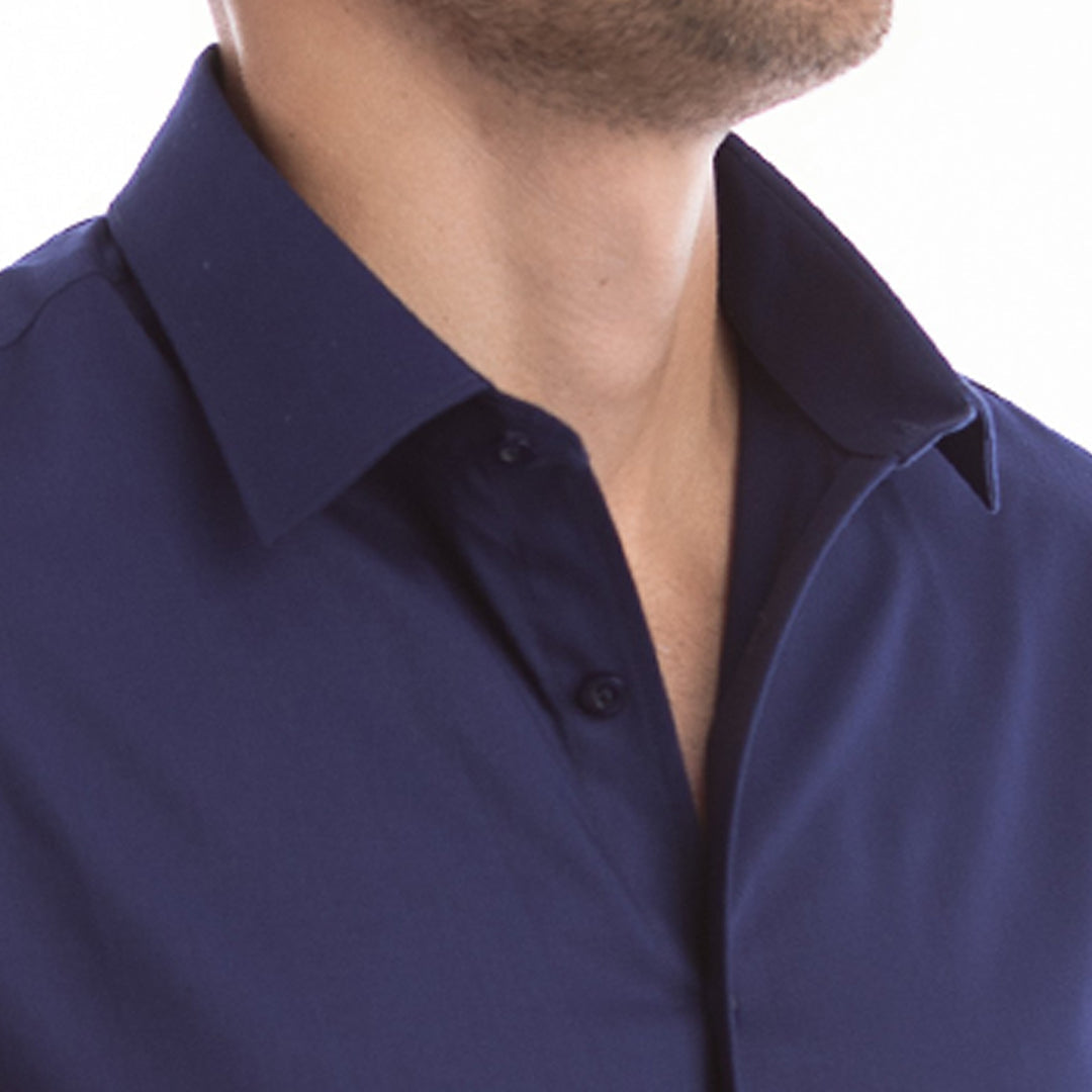 Navy blue shirt worn by a person on a white background