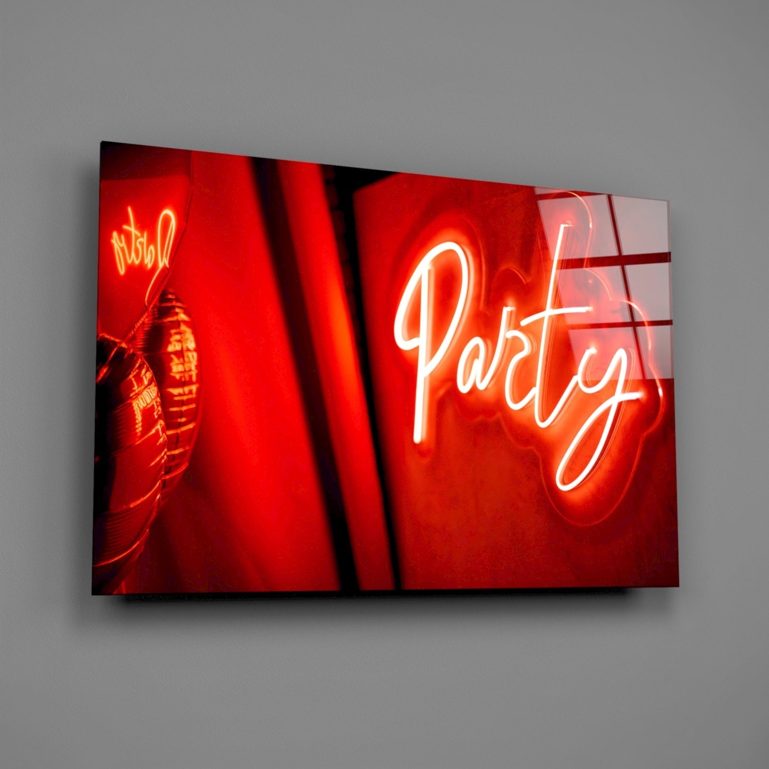 Neon sign with 'Party' text on a red background
